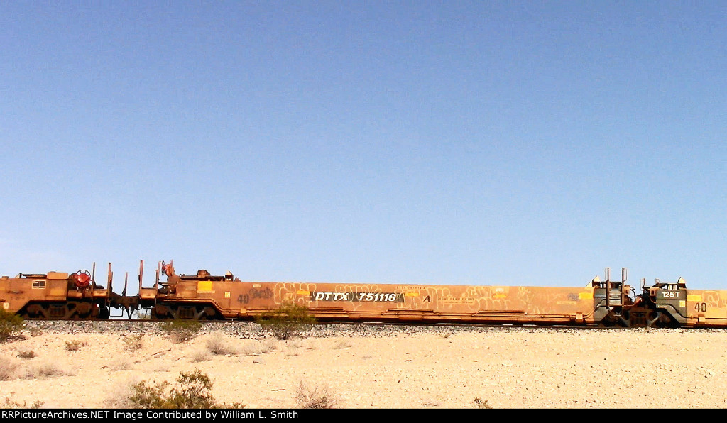 WB Empty Well Car Frt at Erie NV -28